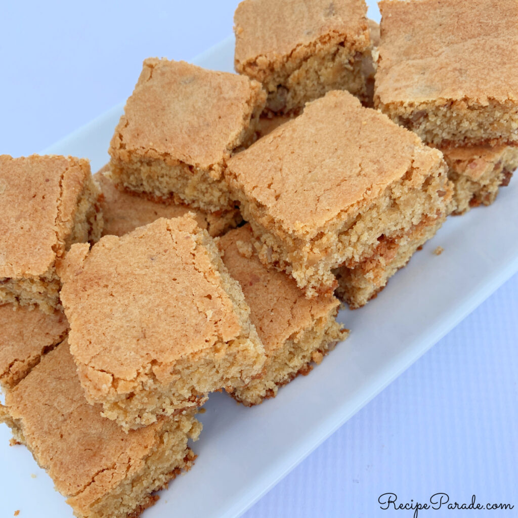 Platter of butterscotch squares, stacked on each other.