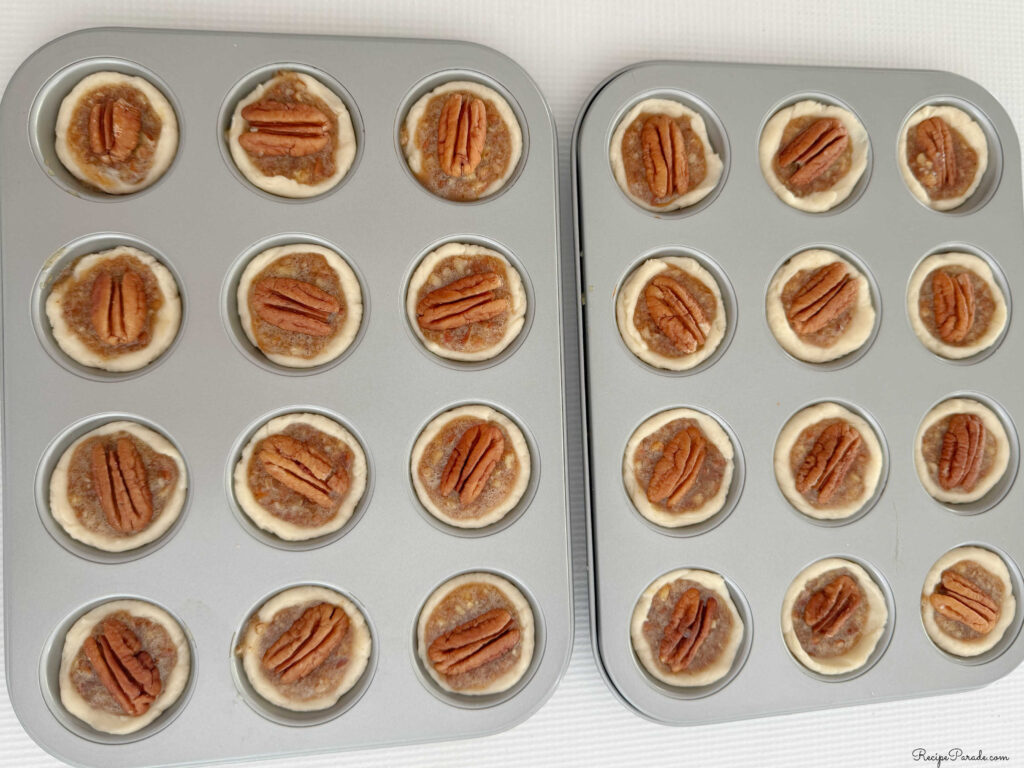 Preparing Pecan Tarts for baking.