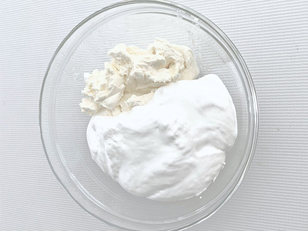 Cream Cheese and Marshmallow Creme in a bowl for our apple dip.