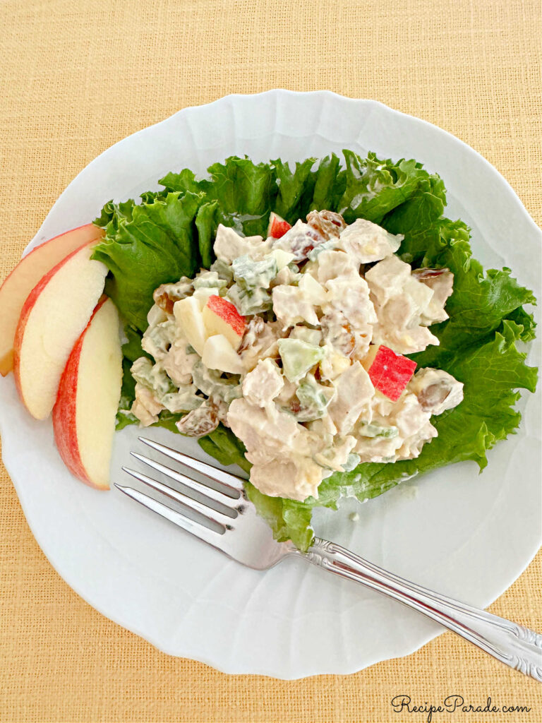 Chicken salad on a bed of lettuce.