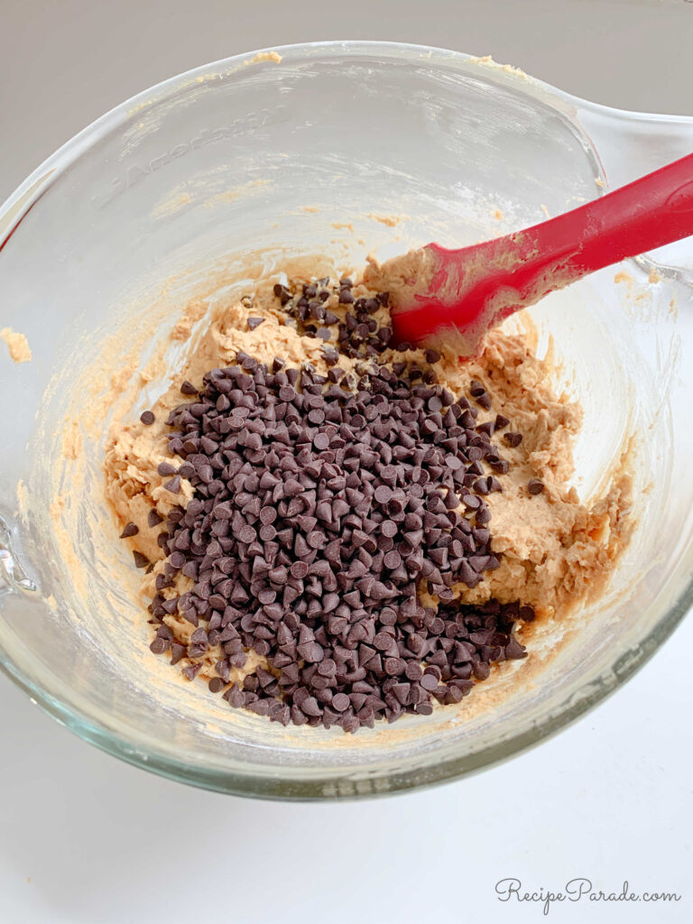Folding chocolate chips into the Peanut Butter Oatmeal Cookies.