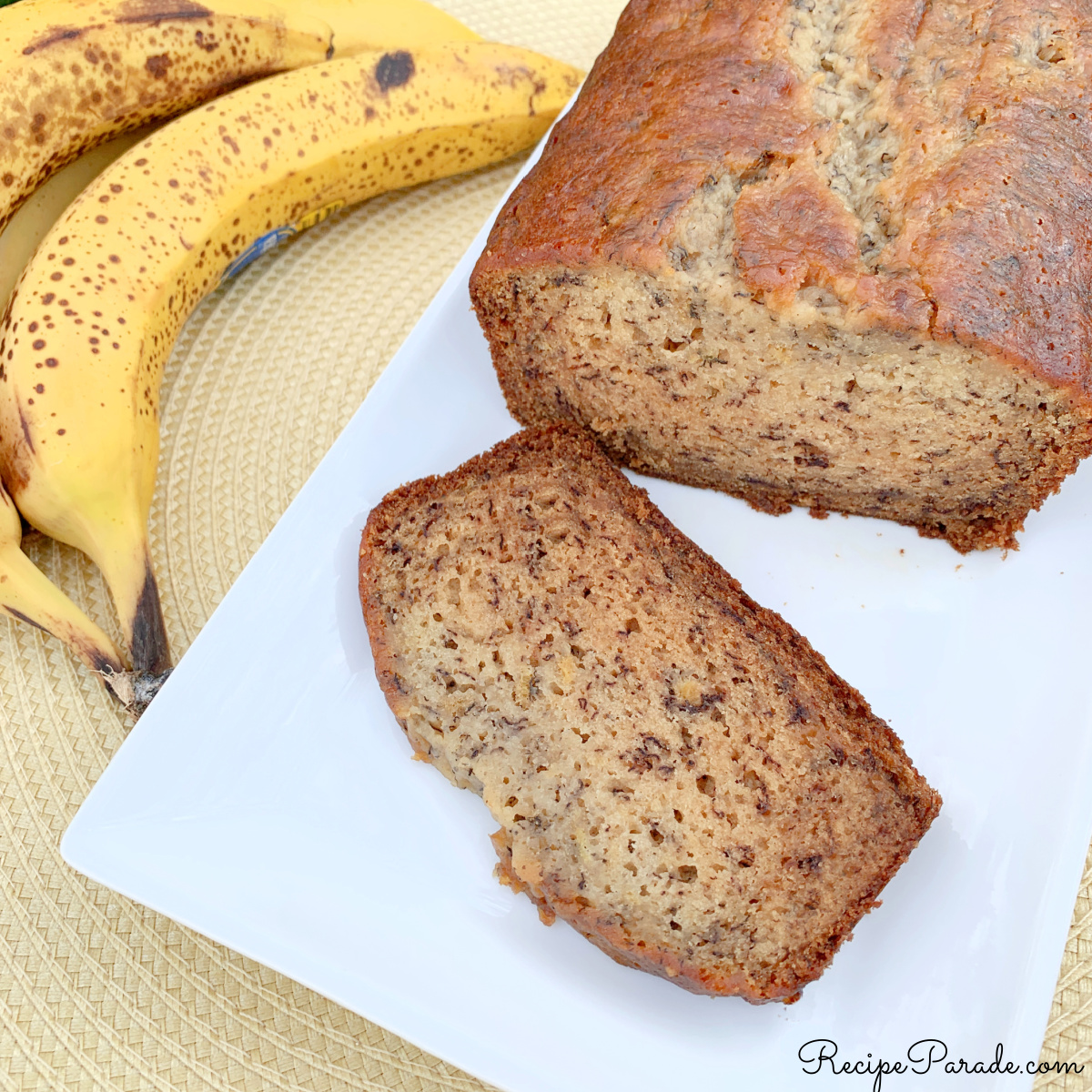 Cream Cheese Banana Bread, sliced, on a plate.