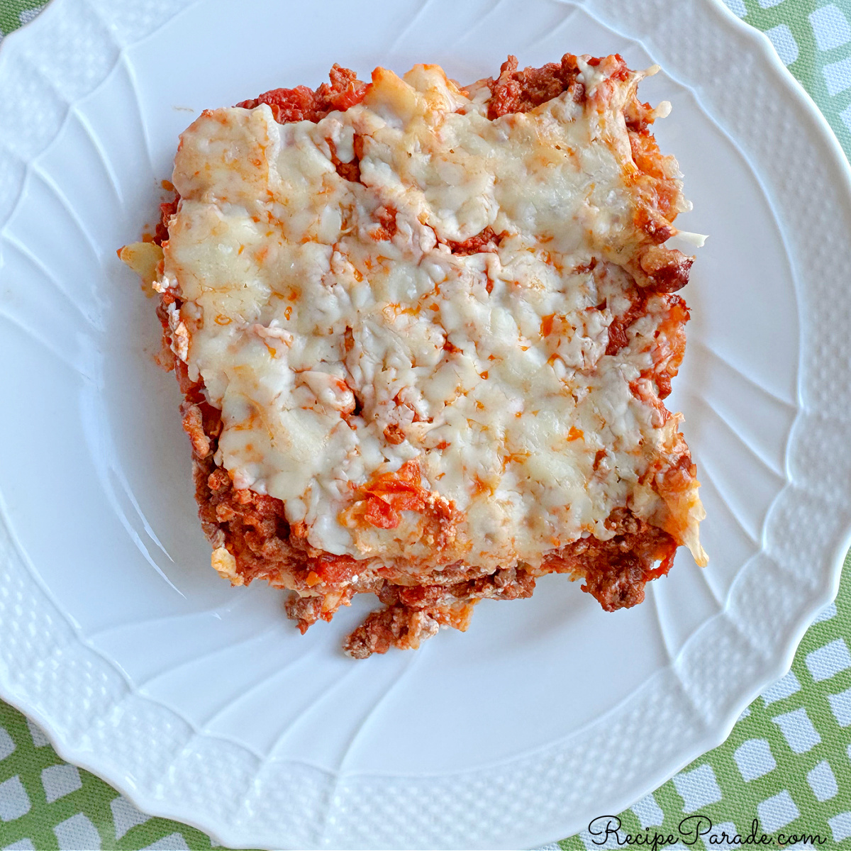 Slice of Cheesy Pasta Bake on a plate.