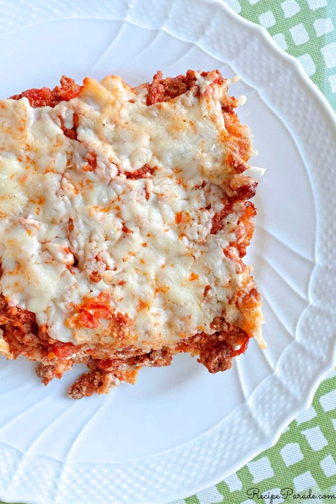 Slice of Cheesy Pasta Bake on a plate.
