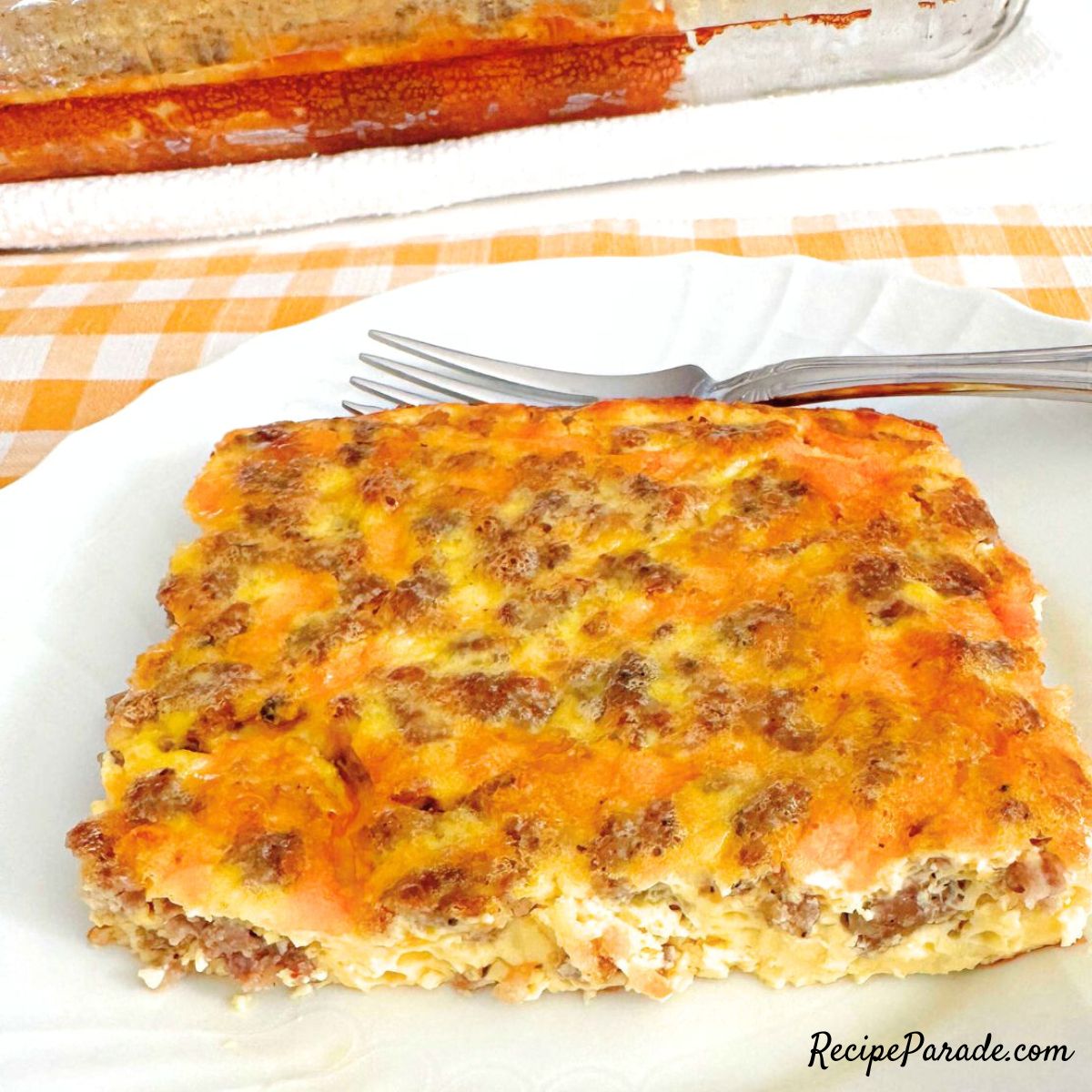 Slice of Egg and Sausage Casserole on a plate.