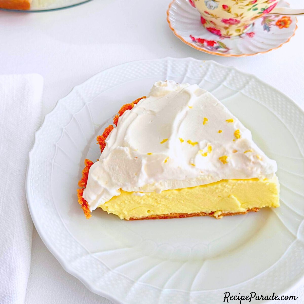 Slice of Frozen Lemon Pie on a plate.