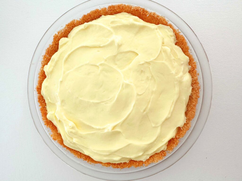 Freshly filled lemon pie, just before freezing.