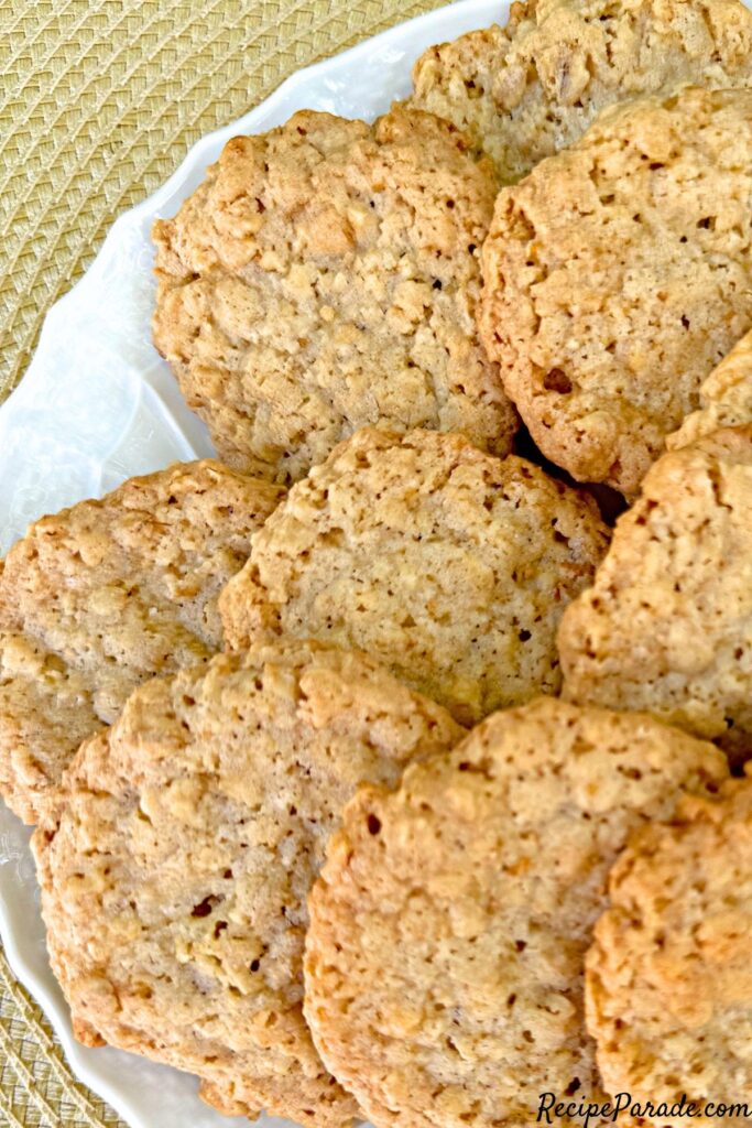 Crisp oatmeal cookies on a plate.