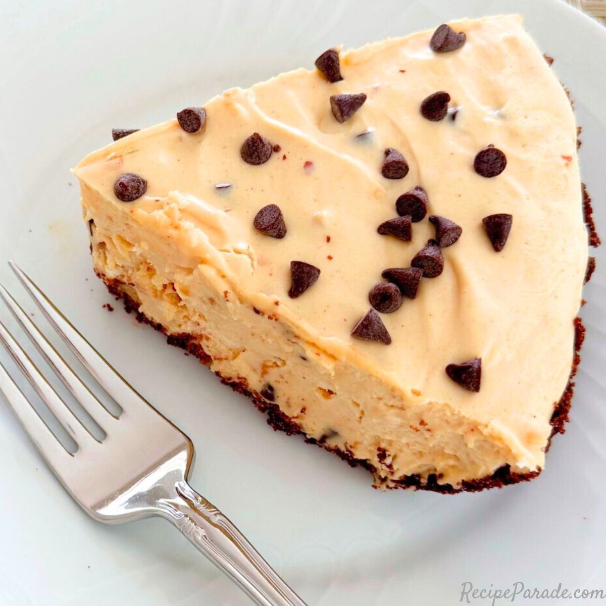 Slice of peanut butter pie on a plate.