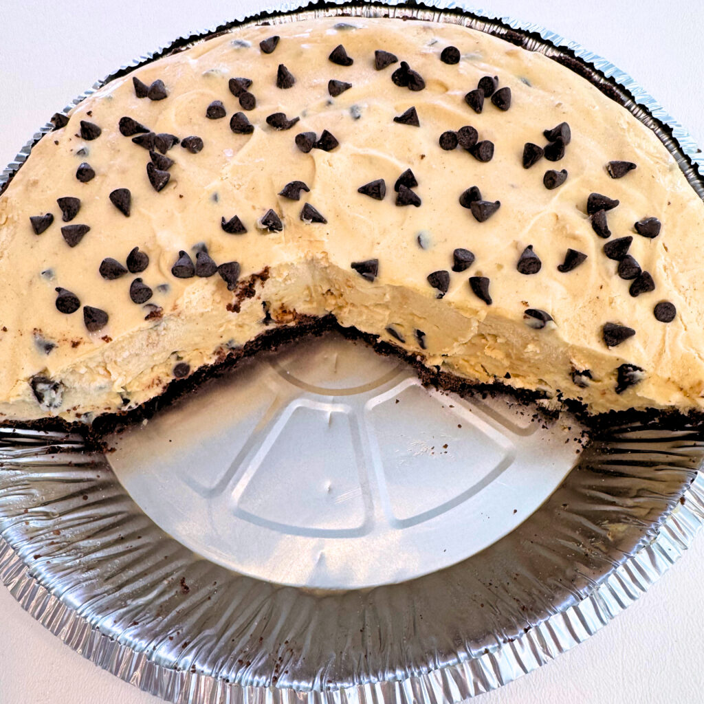 Sliced Peanut Butter Pie with chocolate chips.