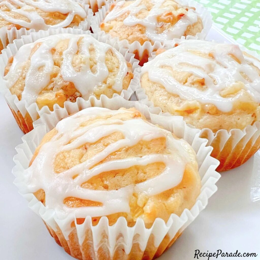 Pineapple Muffins, glazed, on a platter.