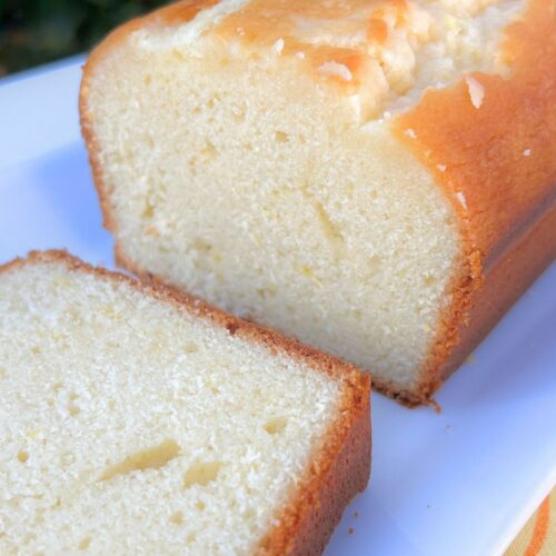 Lemon loaf, sliced, on a platter.