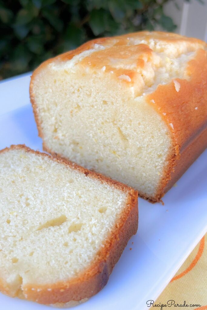 Lemon loaf, sliced, on a platter.