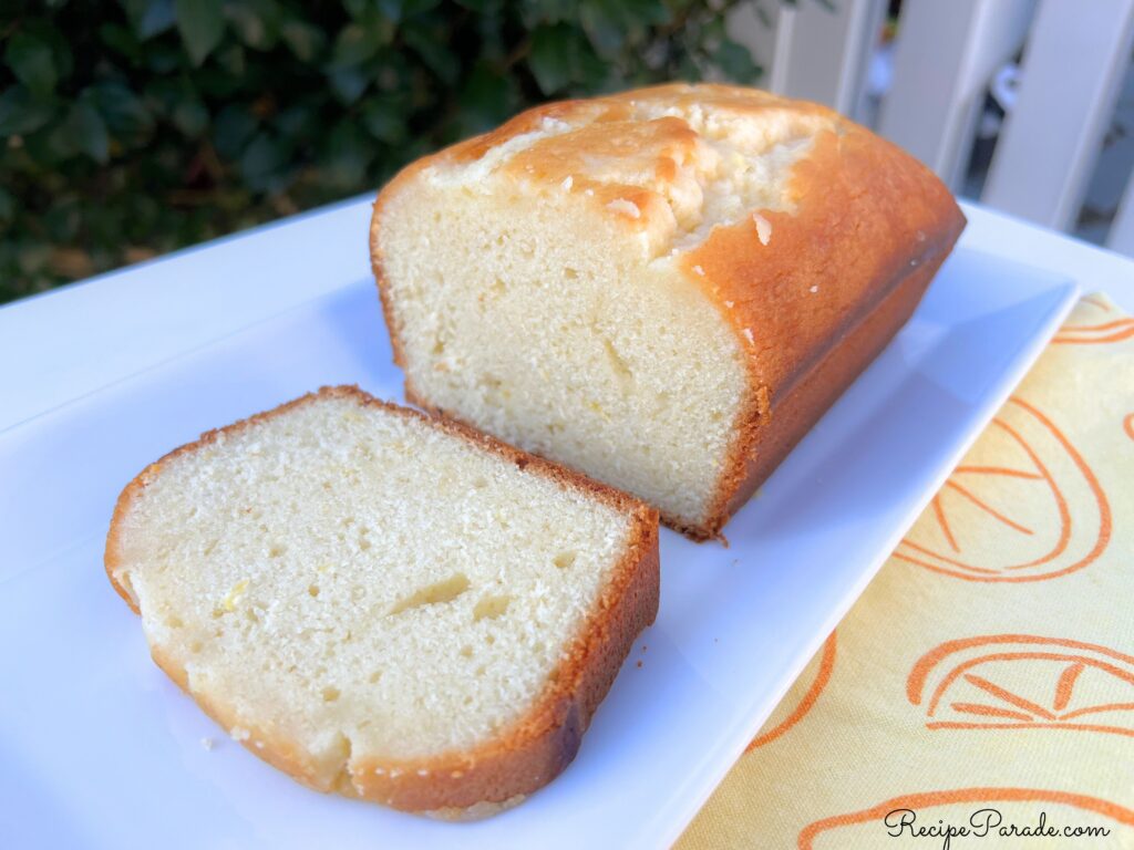 Lemon loaf, sliced, on a platter.