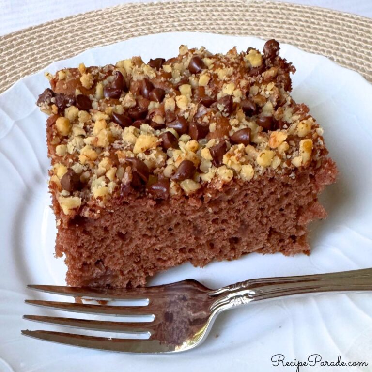 Chocolate Apple Cake, sliced, on a plate.