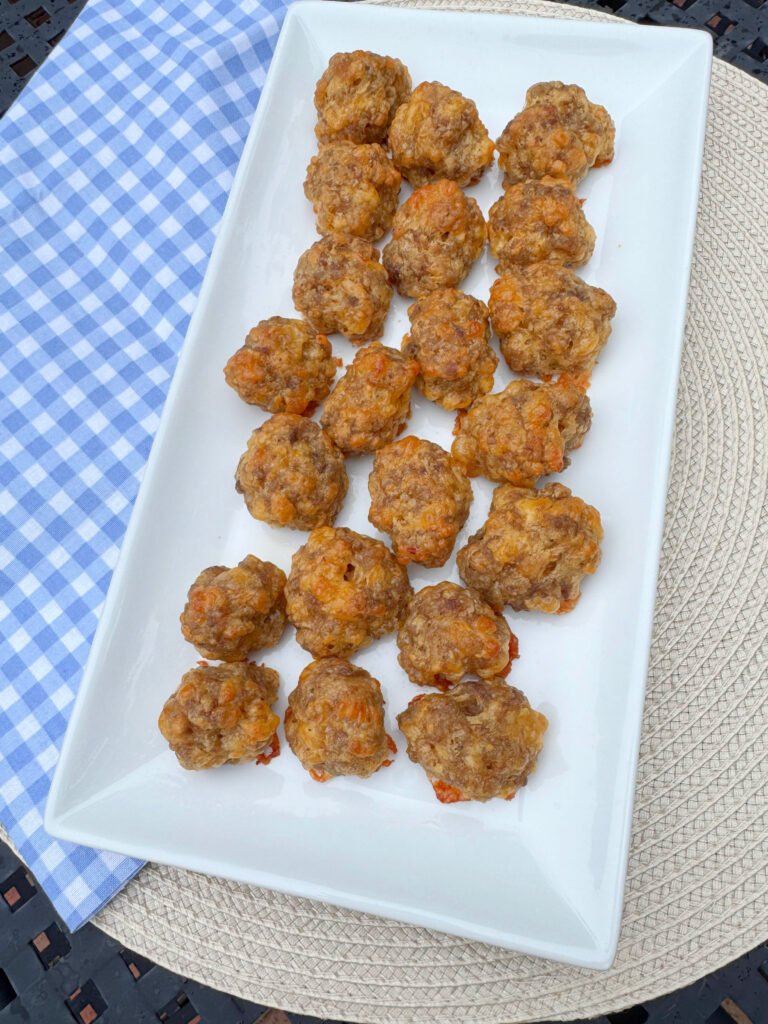 Sausage balls on a tray.